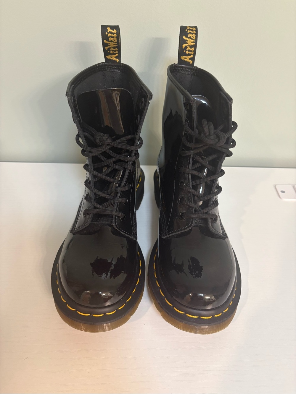 Dr. Martens Black Patent Lace-Up Boots with Yellow Stitching